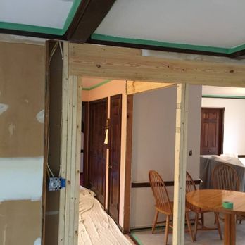 Farnsworth Interiors & Drywall and Plaster - Dark trim, unfinished wall, and beams going in!
The Robertson Family Renovation - Drywall Installation & Repair Near Me - Akron, Ohio