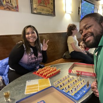 Board Room - Playing guess who - Sports Bars Near Me - Washington, DC, District of Columbia
