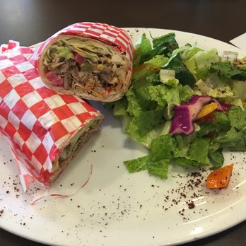 Palmyra Mediterranean House - Chicken shawarma wrap with a salad for the side. - Middle Eastern Near Me - Etobicoke, Ontario Palmyra Mediterranean House - Chicken shawarma wrap with a salad for the side. - Middle Eastern Near Me - Etobicoke, Ontario