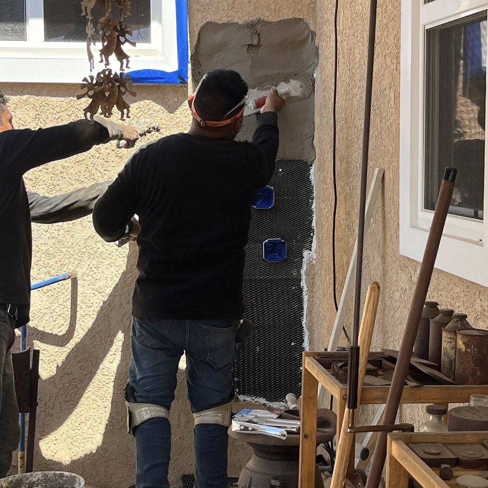 New Light Electric - Closing in the wall, where the old panel was - Electricians Near Me - Bellflower, California New Light Electric - Closing in the wall, where the old panel was - Electricians Near Me - Bellflower, California