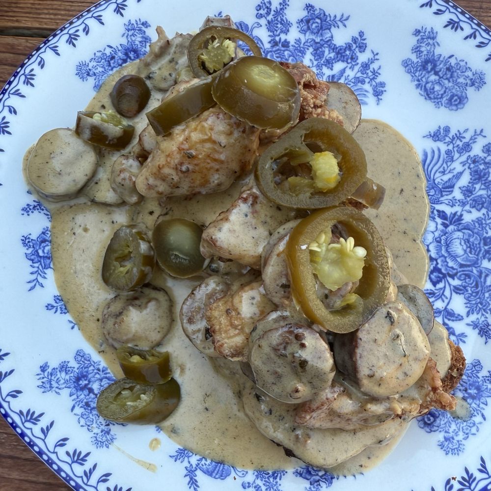 Luella's Southern Kitchen - Biscuit and gravy, pimento cheese, andouille, chicken strips, jalapeños. - Southern Near Me - Chicago, Illinois Luella's Southern Kitchen - Biscuit and gravy, pimento cheese, andouille, chicken strips, jalapeños. - Southern Near Me - Chicago, Illinois
