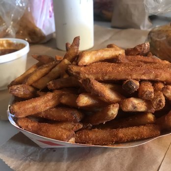 Star Crab - Cajun fries dipped them in Cajun sauce - Seafood Near Me - Riverside, California Star Crab - Cajun fries dipped them in Cajun sauce - Seafood Near Me - Riverside, California