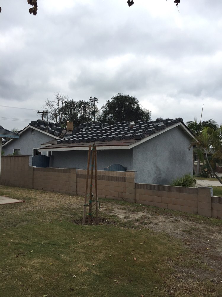 Slide of Mike's Reasonable Roofing