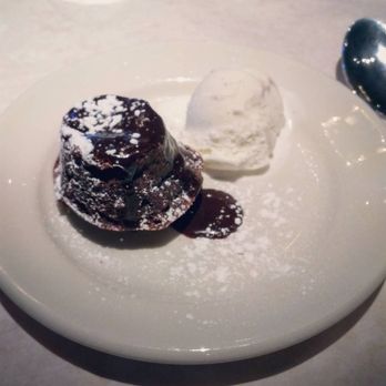 Antico Posto - Chocolate flourless cake with vanilla bean ice cream - Italian Near Me - Oak Brook, Illinois Antico Posto - Chocolate flourless cake with vanilla bean ice cream - Italian Near Me - Oak Brook, Illinois