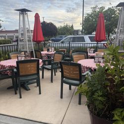 Ludy's BBQ and Catering - The patio where you can dine .