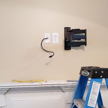 Taylor Electrical Solutions - Receptacle and HDMI hidden behind TV so you have no exposed cables - Electricians Near Me - Barnesville, Georgia