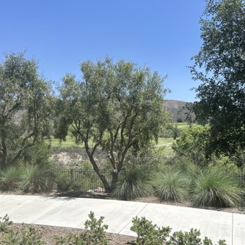Encanto Apartments - Patio view of golf course (Doral Floor Plan) - Apartments Near Me - Corona, California Encanto Apartments - Patio view of golf course (Doral Floor Plan) - Apartments Near Me - Corona, California