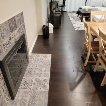 K&H Construction Development - New flooring meets existing tile - General Contractors Near Me