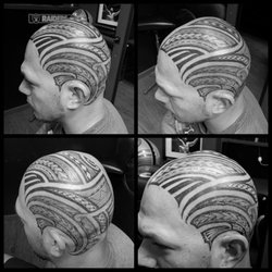 Aftermath Tattoo Studio - Polynesian head tattoo