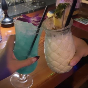 Shipwrecked Tiki Bar - Hawaiian Hula Blossom and Painkiller - Tiki Bars Near Me - Davis, California Shipwrecked Tiki Bar - Hawaiian Hula Blossom and Painkiller - Tiki Bars Near Me - Davis, California