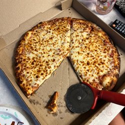 Trophy's Pizza - Extra cheese extra sauce melts in your mouth.