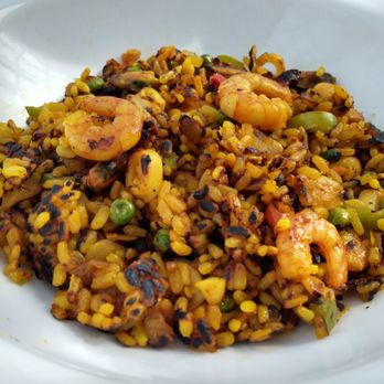 Trader Joe's - TJ's Paella isn't bad. There's a decent amount of seafood (shrimp, calamares & mussels). Socarrat? Don't get your hopes up. 3.5 out of 5 - Grocery Near Me - Olympia, Washington