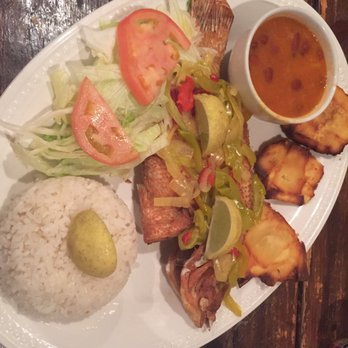 Rancho Choli - Whole Snapper fried with red beans and rice, tostones and sofrito. - Latin American Near Me - Vieques, Puerto Rico Rancho Choli - Whole Snapper fried with red beans and rice, tostones and sofrito. - Latin American Near Me - Vieques, Puerto Rico