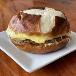 Great Awakening Craft Coffee - Our new breakfast sandwich featuring Turkey Sausage, Egg, Pepper Jack, Chipotle Mayo on a Pretzel Bun.