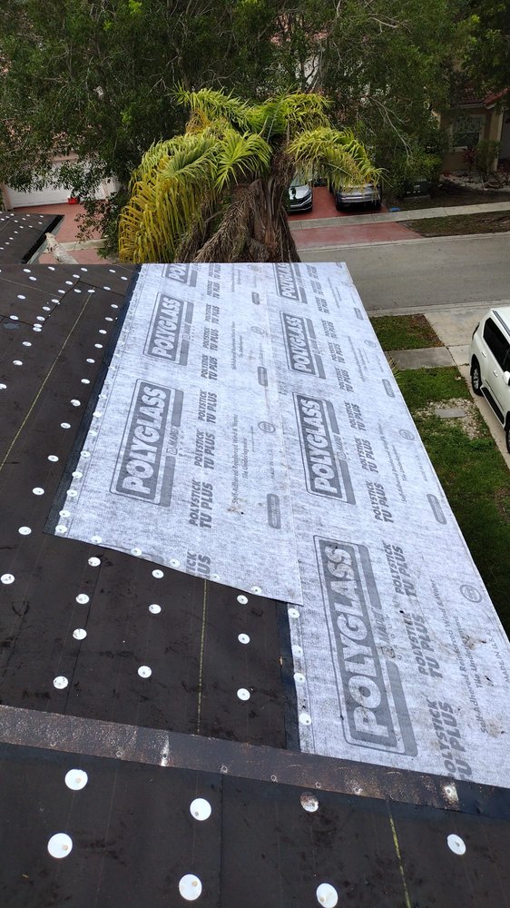 Slide of New Era Roofing Concepts