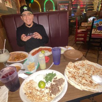 Two Amigos - Great smiles all around i mean can you blame me ?Look at all this DELICIOUS food. Tacos are finger licking good. - Mexican Near Me - Houston, Texas