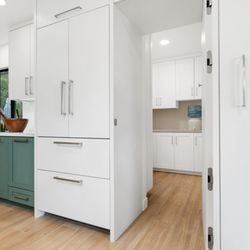 UNIQ  Kitchen  And Bath  Designs - Hidden Pantry in this kitchen design.