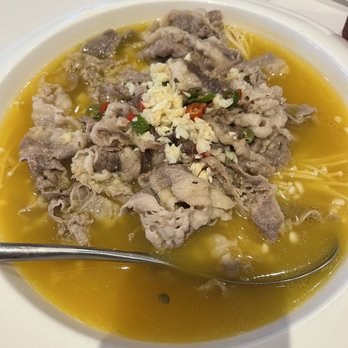 Bamboo House - Sliced beaf in golden soup - Noodles Near Me - Humble, Texas Bamboo House - Sliced beaf in golden soup - Noodles Near Me - Humble, Texas