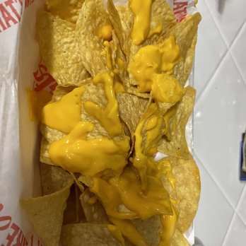 Dairy Queen - Cold cheese nachos.  This is what they consider "extra" cheese ‍ - Ice Cream & Frozen Yogurt Near Me - Tyler, Texas