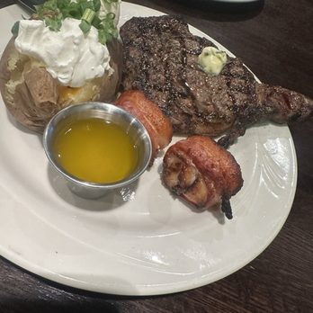 Pelican's West - Ribeye and scallops with a baked potato - Seafood Near Me - Albuquerque, New Mexico