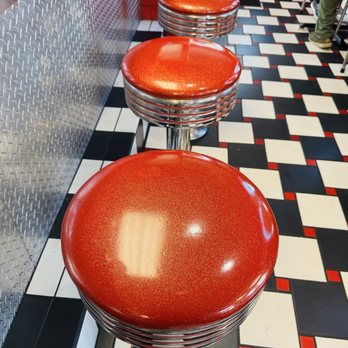 Nicky D’s Burgerz - Bar stools and checkered floor. - Burgers Near Me - Port Huron, Michigan Nicky D’s Burgerz - Bar stools and checkered floor. - Burgers Near Me - Port Huron, Michigan