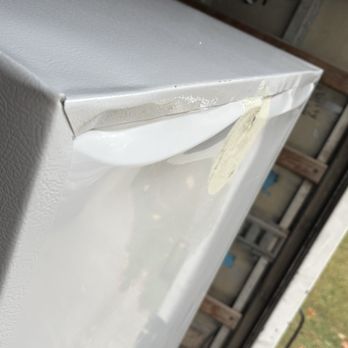 Appliance Factory - Very visible dent/damage of second freezer attempt to be delivered, but rejected before it was even unloaded from the truck. - Appliances Near Me - Terre Haute, Indiana