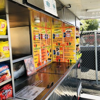 The Dog House - a food truck with food on it - Hot Dogs Near Me - Redlands, California The Dog House - a food truck with food on it - Hot Dogs Near Me - Redlands, California