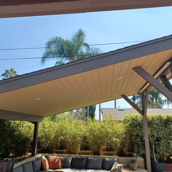 Anderson Built - a patio with a couch and table - General Contractors Near Me Anderson Built - a patio with a couch and table - General Contractors Near Me