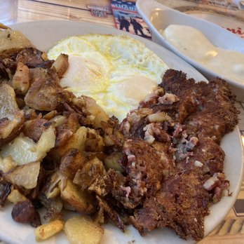 Ronnie's Cafe - Extra crispy corned beef hash and potatoes, eggs over medium, biscuits and gravy - Breakfast & Brunch Near Me - Glendale, Arizona Ronnie's Cafe - Extra crispy corned beef hash and potatoes, eggs over medium, biscuits and gravy - Breakfast & Brunch Near Me - Glendale, Arizona