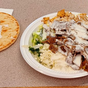 Gyro House - Lamb Gyro and Lemon marinated Chicken platter. The warm pita is out of this world! - Mediterranean Near Me - Elizabethtown, Kentucky Gyro House - Lamb Gyro and Lemon marinated Chicken platter. The warm pita is out of this world! - Mediterranean Near Me - Elizabethtown, Kentucky
