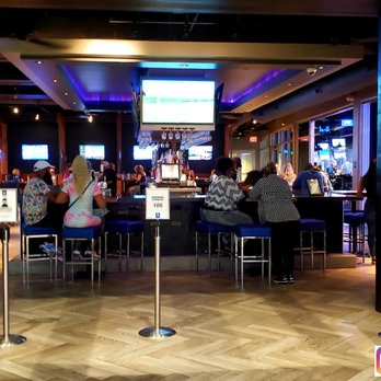 Topgolf - Large bar area for mixing up the golf game - Golf Near Me - Fishers, Indiana