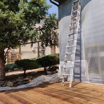 Stellar Painting and Remodeling - a ladder on a deck - General Contractors Near Me - Englewood, Colorado Stellar Painting and Remodeling - a ladder on a deck - General Contractors Near Me - Englewood, Colorado