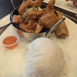 Orange chicken and a vegetaraian crispy egg roll.