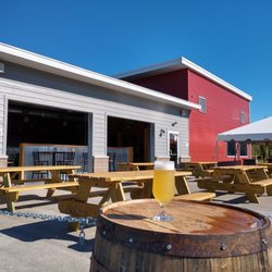 Ahnapee Brewery - Patio with garage doors open.