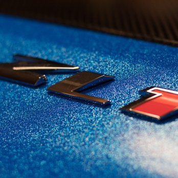 Origin Autoworks - Avery Diamond Blue close up, under emblems and perfect flush with edges - Auto Detailing Near Me - Nampa, Idaho Origin Autoworks - Avery Diamond Blue close up, under emblems and perfect flush with edges - Auto Detailing Near Me - Nampa, Idaho