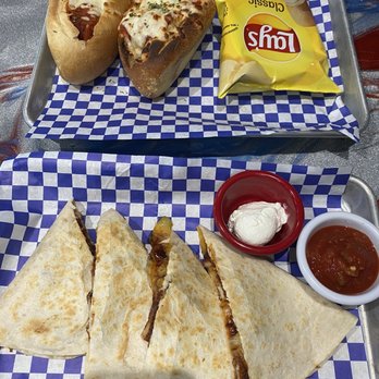 The Hangout by Two Guys - Meatball sub and buffalo chicken quesadilla. - Desserts Near Me - Naples, Florida The Hangout by Two Guys - Meatball sub and buffalo chicken quesadilla. - Desserts Near Me - Naples, Florida