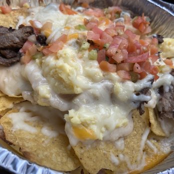 Maverik Adventure's First Stop - Bonfire Grill breakfast nachos with steak- pretty awesome for $3.99 - Gas Stations Near Me - Lehi, Utah Maverik Adventure's First Stop - Bonfire Grill breakfast nachos with steak- pretty awesome for $3.99 - Gas Stations Near Me - Lehi, Utah