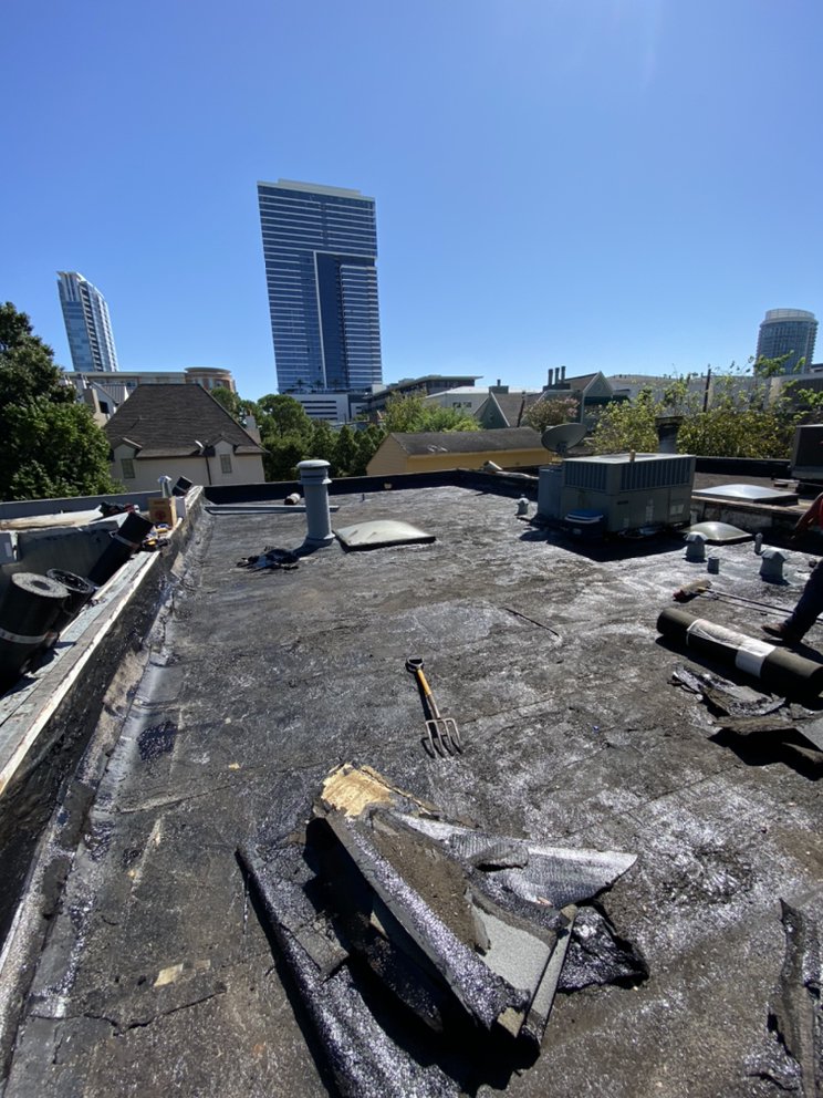 Slide of Quality King Roofing