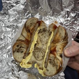 Marbled rye bagel with sausage and egg