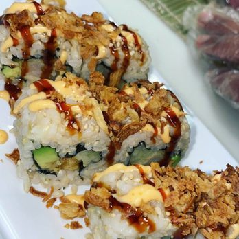 Sushi-Go - a close up of a plate of sushi - Sushi Bars Near Me - Fort Pierce, Florida Sushi-Go - a close up of a plate of sushi - Sushi Bars Near Me - Fort Pierce, Florida
