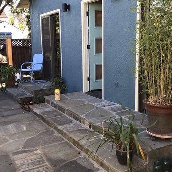 Earthcare Landscaping - a patio with plants and a patio chair - Landscaping Near Me - San Jose, California Earthcare Landscaping - a patio with plants and a patio chair - Landscaping Near Me - San Jose, California