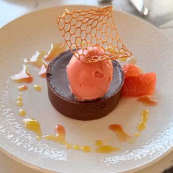 Marché Bacchus - Chocolate Tart with Orange Sorbet - French Near Me - Las Vegas, Nevada Marché Bacchus - Chocolate Tart with Orange Sorbet - French Near Me - Las Vegas, Nevada
