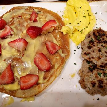 First Watch - Lemon ricotta pancake-after I spread the topping 2 Scrambled eggs 2 chicken apple sausage - Breakfast & Brunch Near Me - Indianapolis, Indiana