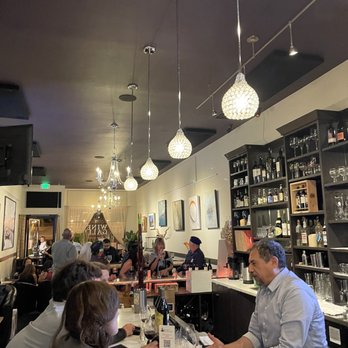 Wine Gallery - a group of people sitting at a bar - Wine Bars Near Me - San Carlos, California Wine Gallery - a group of people sitting at a bar - Wine Bars Near Me - San Carlos, California