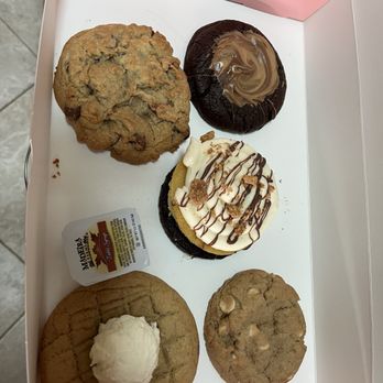 Crumbl - Viera - 6 pack but I stole one. LOL! - Bakeries Near Me - Melbourne, Florida