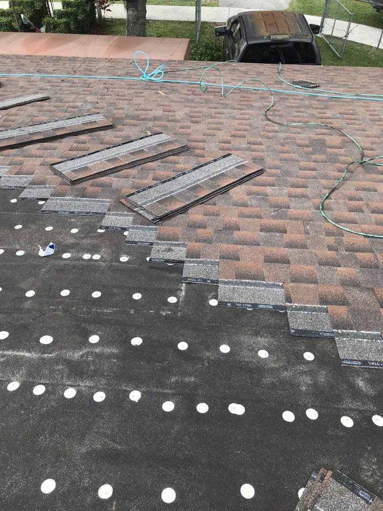 Slide of Red River Roofing