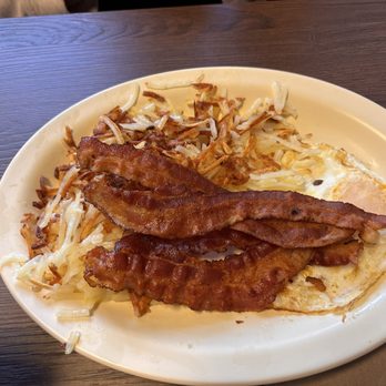 Tony’s Diner - One egg, bacon and hash browns and one pancake (in separate photo).. - Breakfast & Brunch Near Me - O'Fallon, Missouri Tony’s Diner - One egg, bacon and hash browns and one pancake (in separate photo).. - Breakfast & Brunch Near Me - O'Fallon, Missouri