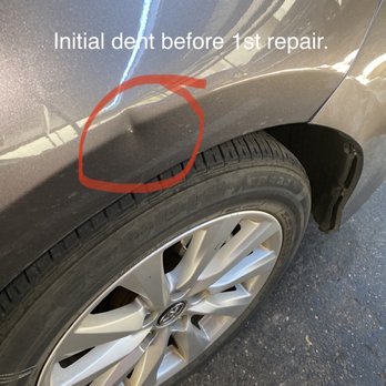Dent King Mobile Service - Side view of initial dent on the front. - Mobile Dent Repair Near Me