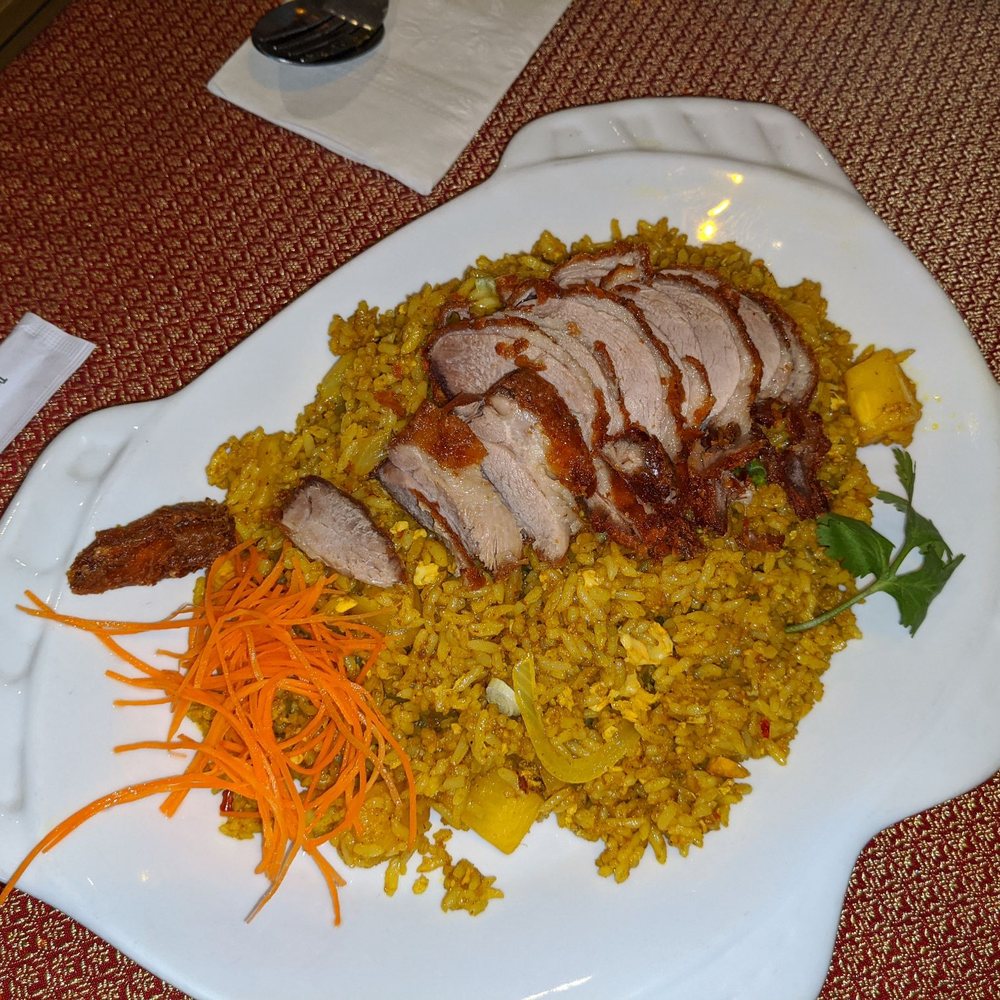 Ploy Thai - Crispy duck over curry pineapple rice absolutely awesome! - Thai Near Me - Brandon, Florida Ploy Thai - Crispy duck over curry pineapple rice absolutely awesome! - Thai Near Me - Brandon, Florida