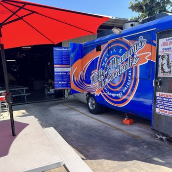 Malik's Philly's Phamous Cheesesteaks - Truck and entrance to seating area. - Food Trucks Near Me - Universal City, Texas Malik's Philly's Phamous Cheesesteaks - Truck and entrance to seating area. - Food Trucks Near Me - Universal City, Texas